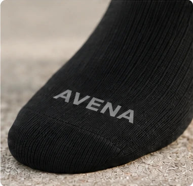 Close view of the black knit and AVENA toe mark