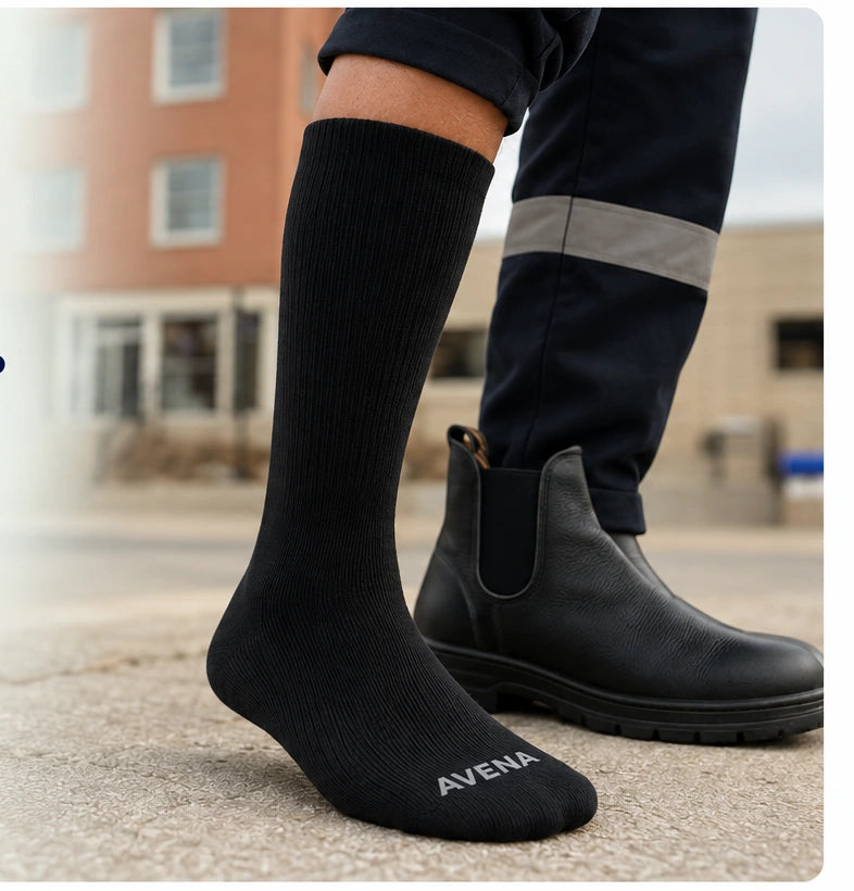 Black Avena compression sock worn with the lower leg and branded toe visible